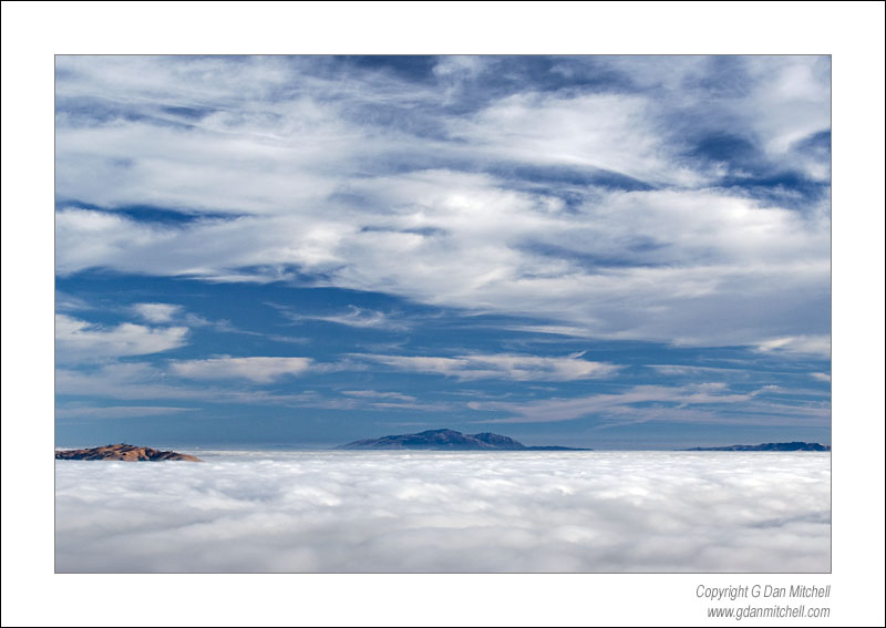 DiabloMissionFog2006|09|02: Mount Diablo, Fog. Mission Peak, California. September, 2, 2006. © "copyright G Dan Mitchell". ("sales") keywords: mount diablo mission peak fog bank high clouds blue sky san francisco bay area california color photograph