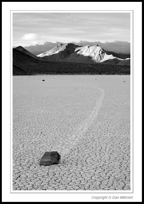 PlayaRockCurveBW2006|04|03: Curving Rock Trail. Racetrack Playa, Death Valley National Park. April 3, 2006. &copy; Copyright G Dan Mitchell.