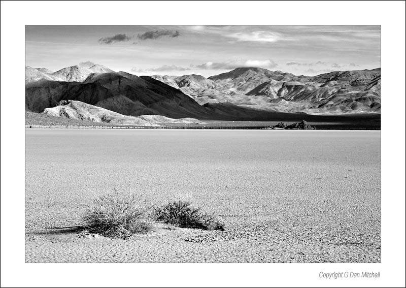 RacetrackGStandBW2006|04|03: Racetrack Playa and the Grandstand. Death Valley National Park. April 3, 2006. © Copyright G Dan Mitchell.