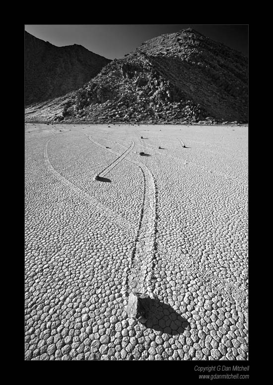 RacetrackSource2007|04|03: Source of Racetrack Playa Rocks. Death Valley National Park, California. April 3, 2007. &copy; "Copyright G Dan Mitchell". ("sales")    keywords: moving rocks source racetrack play death valley national park california black and white photograph