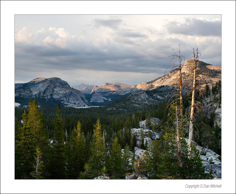 TenayaSunset2006|07|24: Olmstead Point, Tenaya Lake Sunset. Yosemite National Park. July 24, 2006. &copy; copyright G Dan Mitchell.    Keywords: olmstead point tenaya lake sunset tioga road trees rocks clouds color photograph