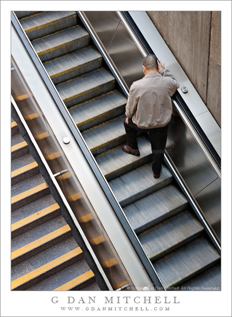 Man on Escalator Man on Escalator