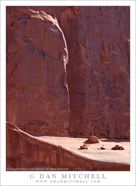 Ledge With Fallen Rocks - Red cliffs and rocks on a ledge at Park Avenue, Arches National Park