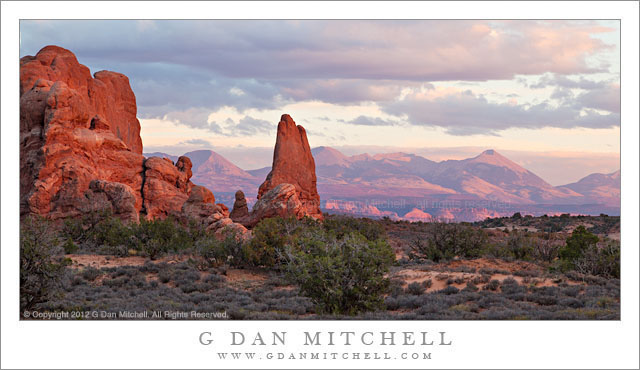 La Sal Mountains, Evening La Sal Mountains, Evening - Sunset light on sandstone towers of Arches National Park and on the distant La Sal Mountains, Utah